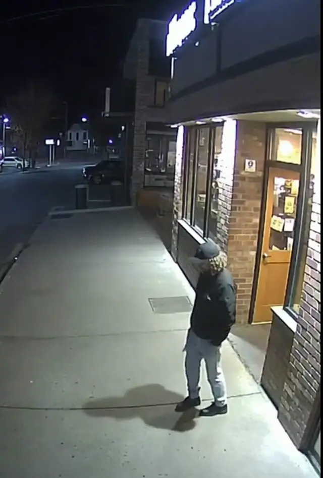 Poster frame: CCTV knife detection: a kitchen knife on a night street